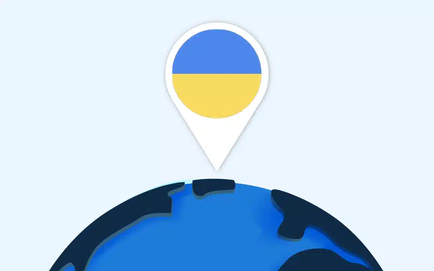 Weltkugel mit Standort-Pin, auf dem die Flagge der Ukraine zu sehen ist